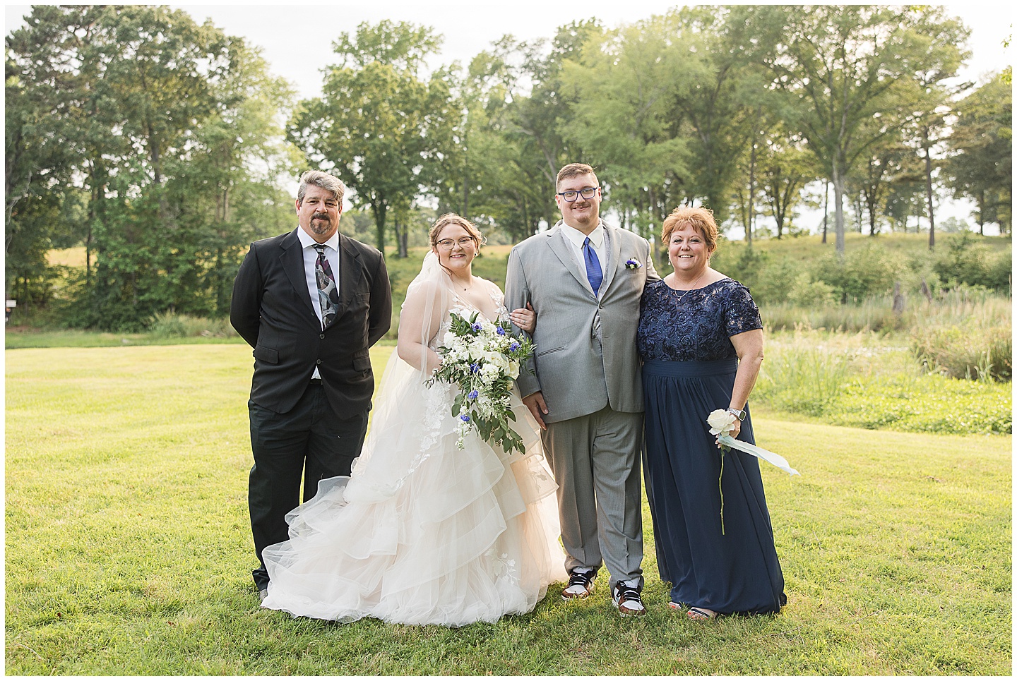 East Texas Navy and Silver Wilderness Spring Wedding Silver Star Ranch